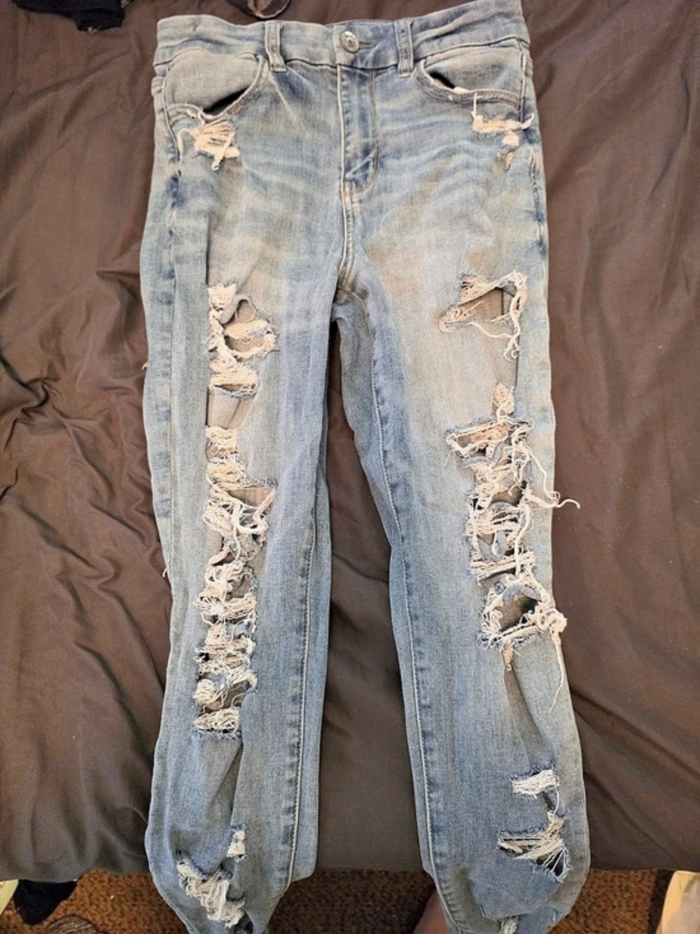 American Eagle Next Level Stretch Distressed Skinny Jeans in Blue Size 4